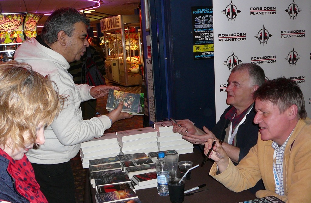 Ken MacLeod (second right) chats with a fan