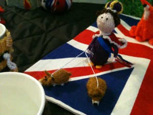 Lauren O'Farrell's knitted creation - the Queen walking her corgis