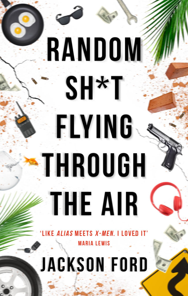 The new cover for RANDOM SH*T FLYING THROUGH THE AIR, containing images of various random items including a walkie talkie, a pair of sunglasses, a revolver and two eggs in a frying pan.